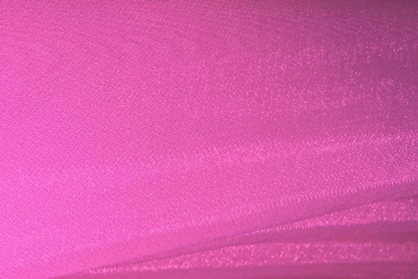 Closeup of pink cloth pattern, abstract background