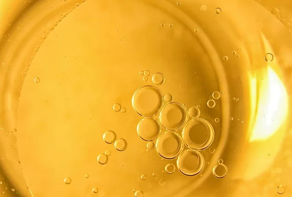 Yellow Background Cooking Oil Bubbles Drops Water — Stock Photo, Image