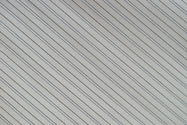 Texture of a surface of a fabric with diagonal lines — Stock Photo, Image