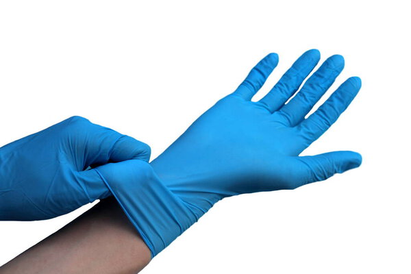 Female hands put on blue rubber gloves