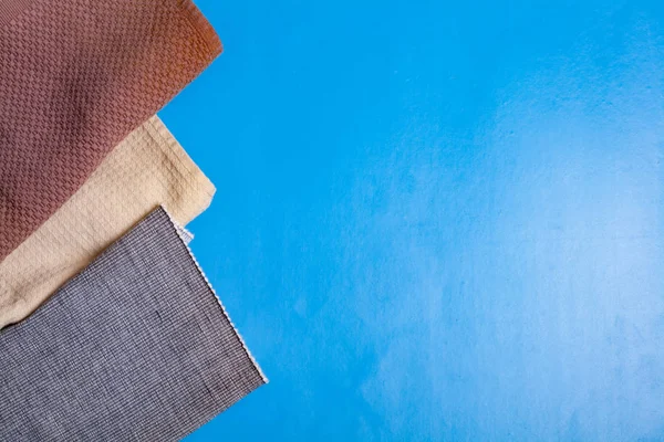 Rolou toalha de cozinha no fundo, espaço livre — Fotografia de Stock