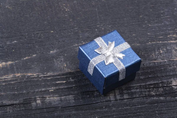 Small Blue Gift Box Silver Bow Wooden Background — Stock Photo, Image