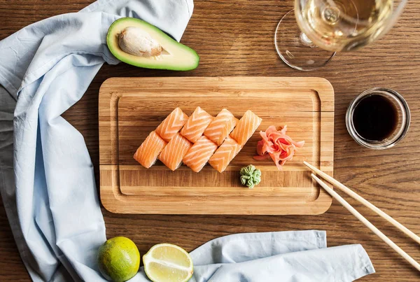 Japanese Sushi Rolls Wasabi Ginger Soy Sauce Chopsticks Glass Wine — Stock Photo, Image