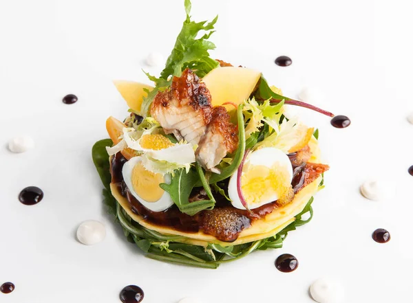 restaurant serve salad with eel, quail eggs and caviar