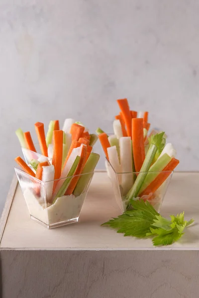 stock image Snacks, amusebouche, appetizers, fingerfood - vegetable straw, Crudites with sauce on a light background