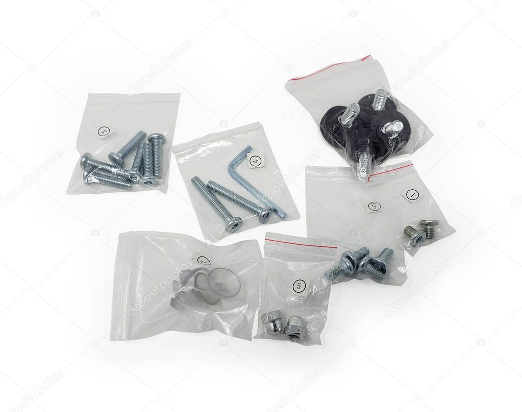 Bolts, Nuts, Fastners, Screws on white with Clipping Path seperated in plastic bags numbered.