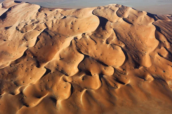 Вид с воздуха на песчаные дюны в Rub Al Khali — стоковое фото