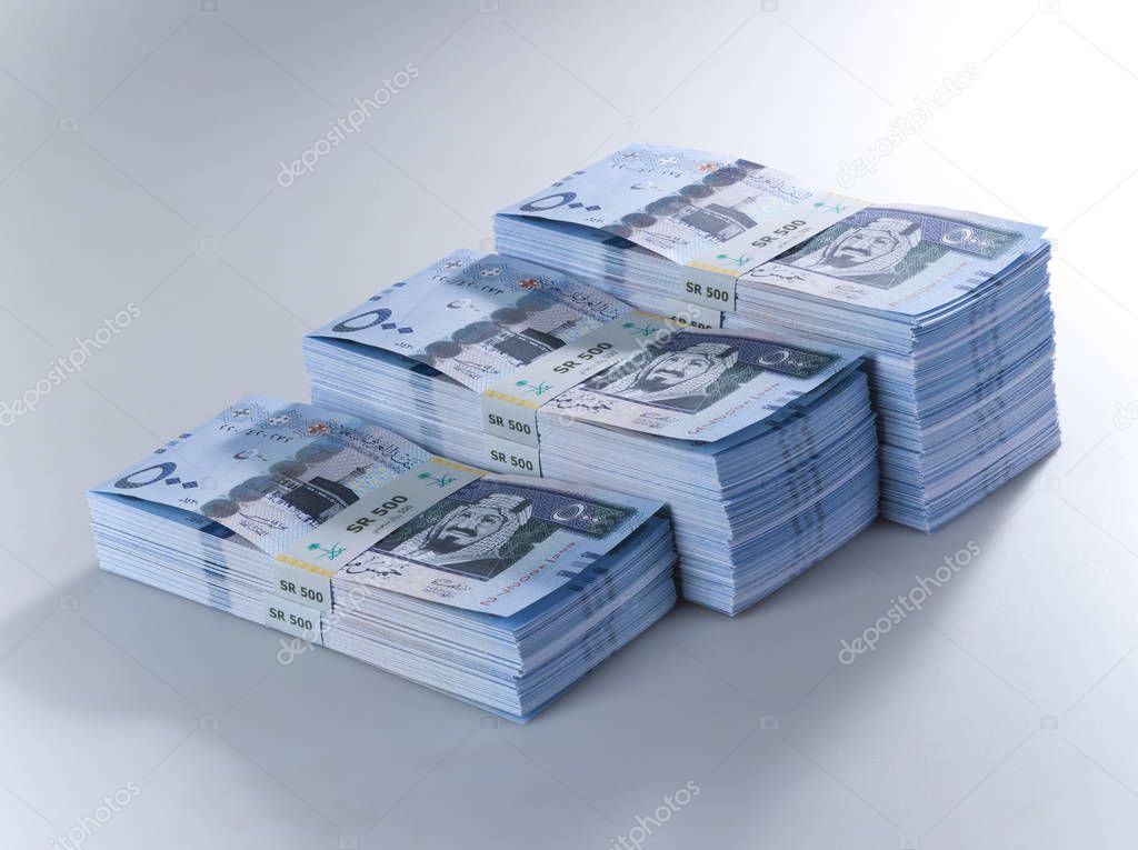 Stacks of Saudi Riyal Banknotes of 500 with image of King Abdulah