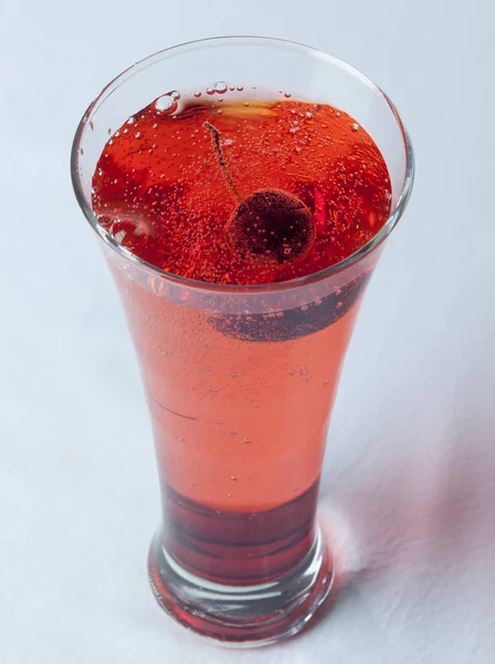 A glass of Cherry Juice close up with cherry fruit and Air Buble — Stock Photo, Image