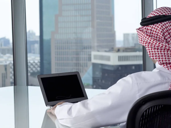 Saudi Arab Man Watching Laptop at Work Contemplating