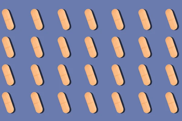 Patroon Van Oranje Curcumine Kurkuma Pillen Met Schaduw Paarse Achtergrond — Stockfoto
