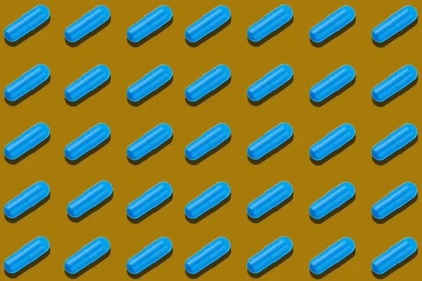 Kahverengi Arka Planda Mavi Haplarla Kusursuz Desen Tıp Sağlığı Eczacılık — Stok fotoğraf