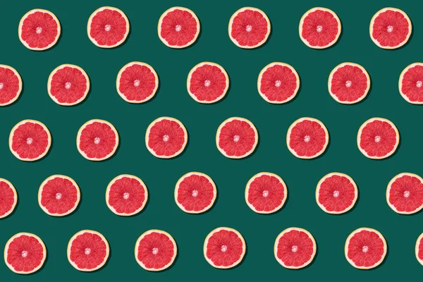Färsk Röd Apelsin Eller Grapefrukt Grön Färg Bakgrund Vackra Snittade — Stockfoto