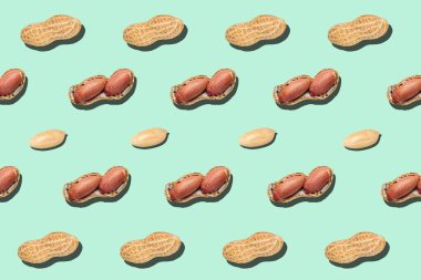 Açık yeşil arka plan fındık besin dokusunda çatlak yer fıstığı minimumu desen