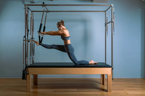 Pilates woman in reformer teaser exercise in gym indoors. Active lifestyle, body positive, beautiful color — Stock Photo, Image