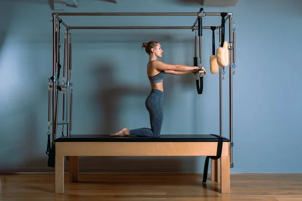 Pilates woman in reformer teaser exercise in gym indoors. Active lifestyle, body positive, beautiful color — Stock Photo, Image