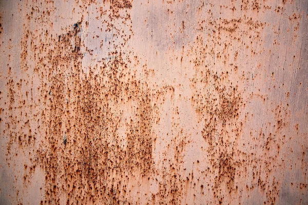 Rusty metal surface with peeled paint and etched numbers. Abstract background texture. — Stock Photo, Image