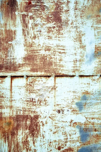 Textura metálica, metal oxidado con pintura pelada, trozos de metal con soldaduras. Fondo, espacio de copia . —  Fotos de Stock