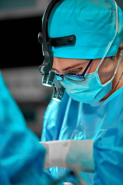 Surgeons team in the operating room, portraits close-up. modern operating, plastic surgery. Beauty industry — 스톡 사진