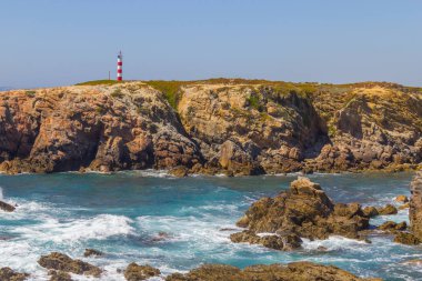 Lighthouse in Porto Covo beach