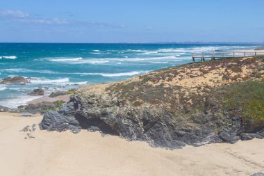 Viepont over a cliff in Queimado beach,  Vila Nova de Milfontes