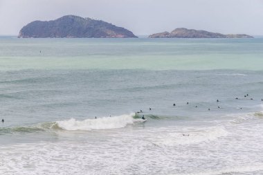 Costao Surfers do Santinho beach