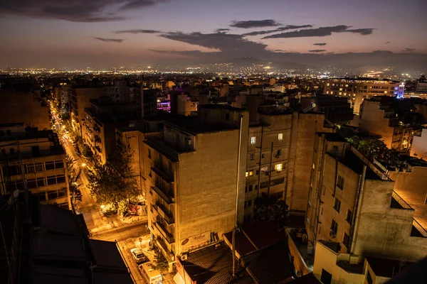 Lumières d'Athènes ville au coucher du soleil — Photo
