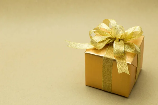 Christmas gift box on brown background — Stock Photo, Image