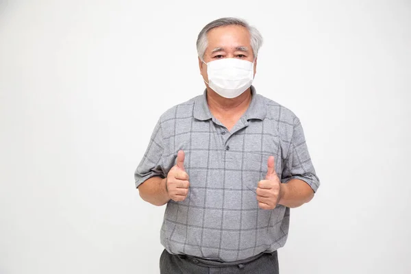 Ein Älterer Asiatischer Mann Trägt Eine Schützende Gesichtsmaske Gegen Coronavirus — Stockfoto