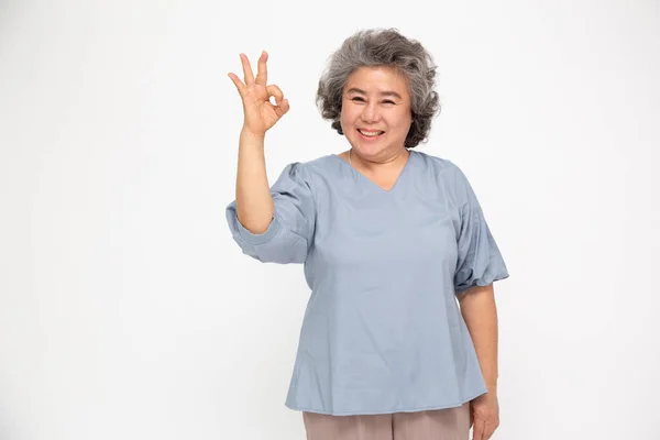 Porträtt Glad Senior Asiatisk Kvinna Gest Eller Visar Handen Och Stockbild