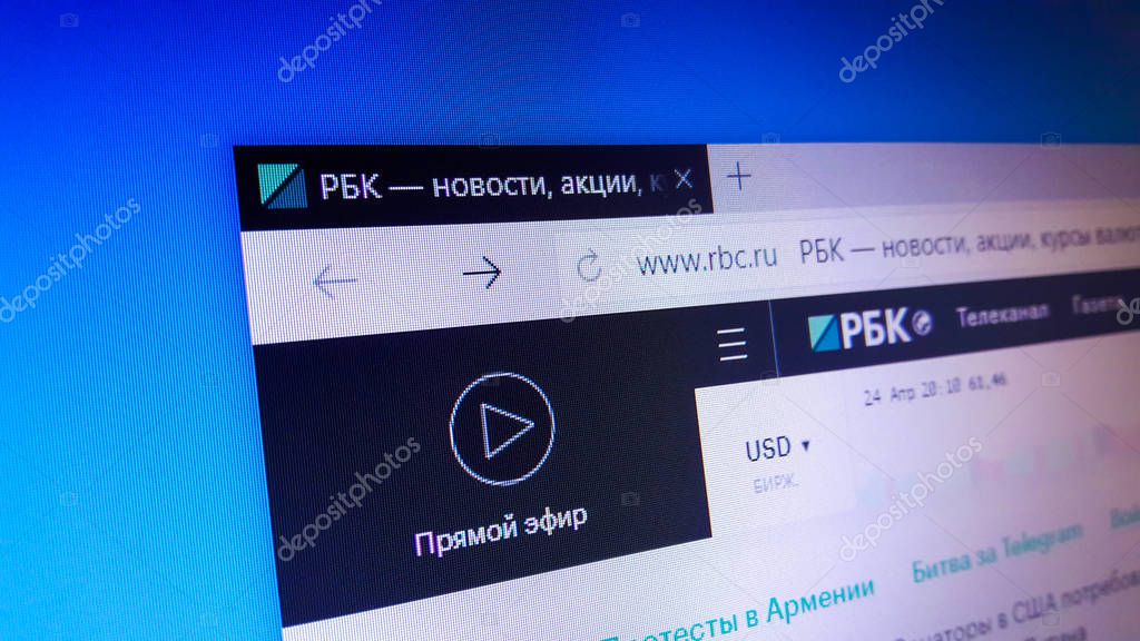 Minsk, Belarus - April 25, 2018: The homepage of the official website for RBC (The RBK Group or RosBiznesKonsalting), a large Russian media group, informational agency, news web-portal, business TV.