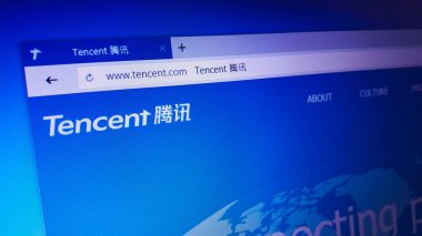Minsk, Belarus - April 17, 2018: The homepage of the official website for Tencent Holdings Limited, a Chinese multinational investment holding conglomerate clipart