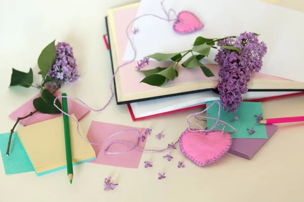 Branches Lilac Flowers Table Paper Notebooks Pencils Preparation Greetings Valentine — Stock Photo, Image