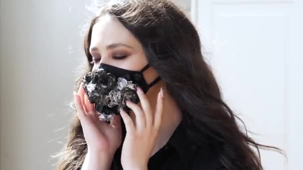 Beautiful girl wear creative mask of fresh flower, enjoy breaths clean air relax — Stock Video