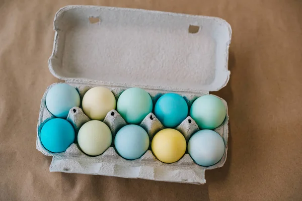 Top View Colored Easter Eggs Cardboard Pack — Stock Photo, Image