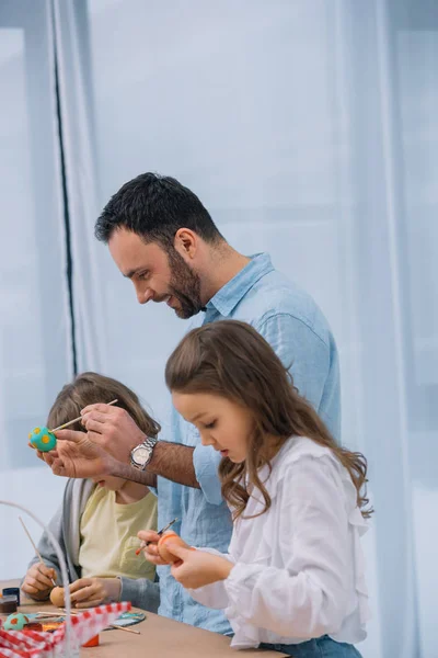 Happy Young Father Painting Easter Eggs Kids — Stock Photo, Image