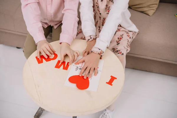 Cropped Shot Kids Preparing Greeting Mothers Day Home Couch — Stock Photo, Image