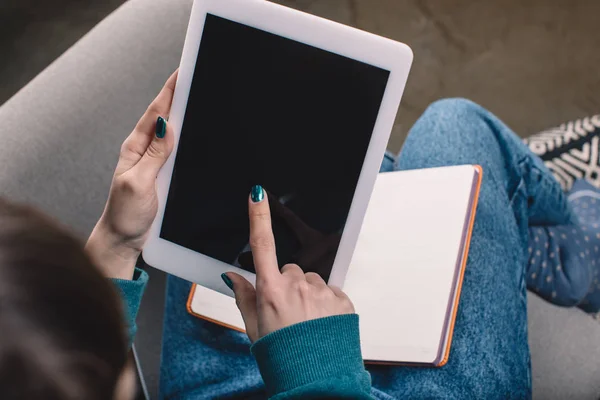 Cropped image of girl using tablet — Stock Photo