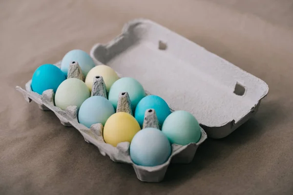 Multi-colored easter eggs in cardboard pack — Stock Photo