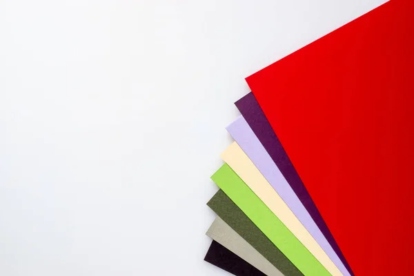 Colored papers in envelope — Stock Photo, Image