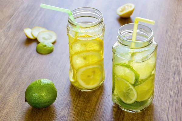 A couple of cool cocktails of fresh fruit in jars — Stock Photo, Image