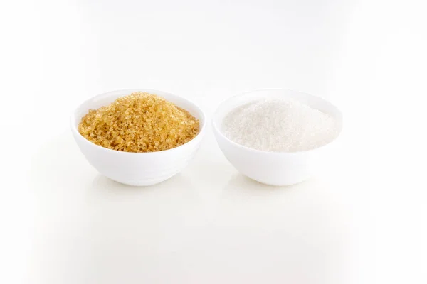 Brown Natural Cane Sugar Plain White Granulated Sugar White Rosettes — Stock Photo, Image