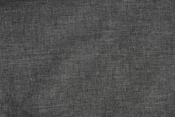 Background of dense gray-black fabric with wicker texture