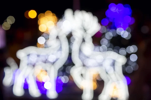 Iluminación Festiva Figuras Ciervos Brillando Con Luces Bokeh — Foto de Stock