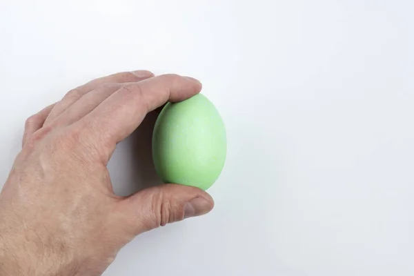 Hand Holds Green Easter Egg White Background Concept — Stock Photo, Image