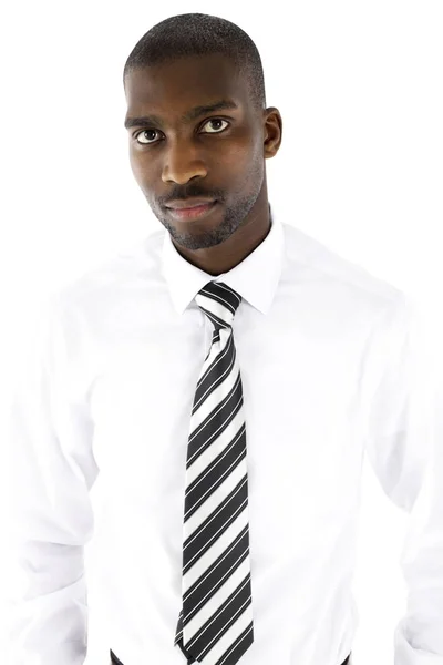 Retrato de un hombre de negocios africano en un estudio con un... — Foto de Stock