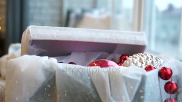 Box with Christmas decorations — Stock Video