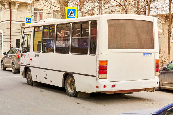 Rostov-on-Don / Russia - January 2018: A small PAZ bus rides through the streets of a big city in winter