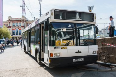 Rostov-on-Don / Russia - May 2018: A large bus with a bio-toilet placed inside the booths serves a large number of people during the holiday clipart