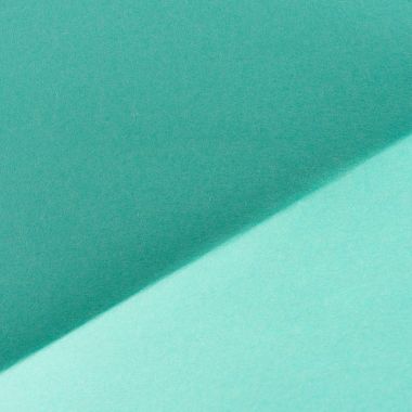 close-up shot of turquoise color folded paper for background clipart